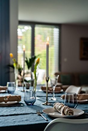 tablescape-table-with-tablecloth-and-candles-serv-2025-02-12-00-49-35-utc